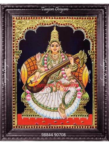 Traditional Saraswathi Tanjore painting with veena and gold foil detailing